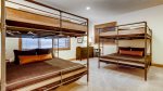 The Breck Haus - Bunkroom with 2 queen over queen bunks, adjacent to rec room